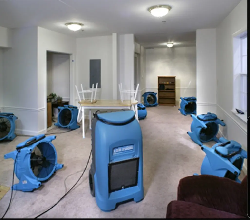 Air movers and dehumidifier setup for Water Damage Restoration in Summit